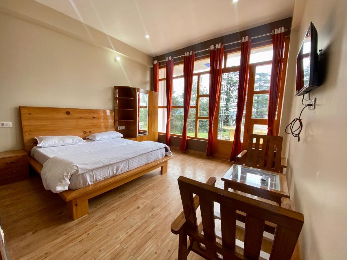 Hotel Mansarovar Inn Munsyari Экстерьер фото