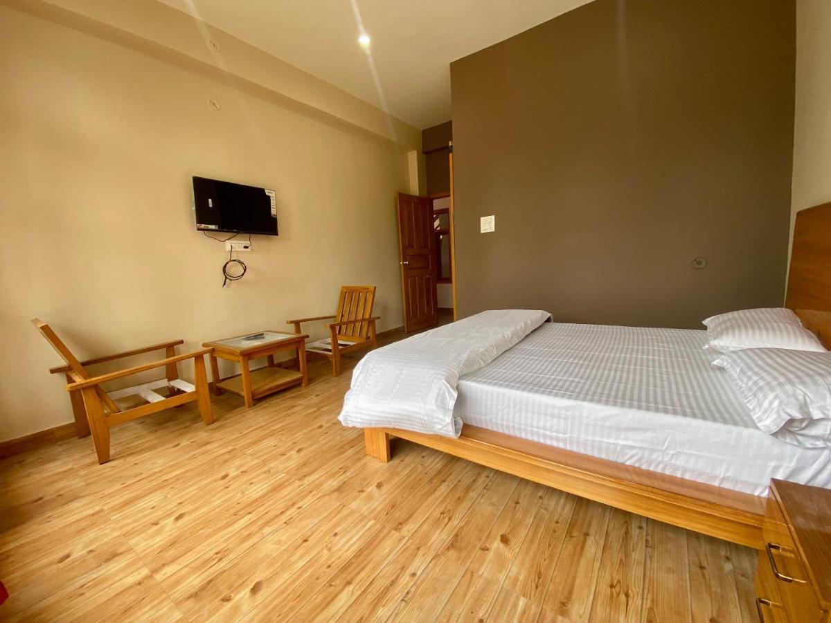 Hotel Mansarovar Inn Munsyari Экстерьер фото