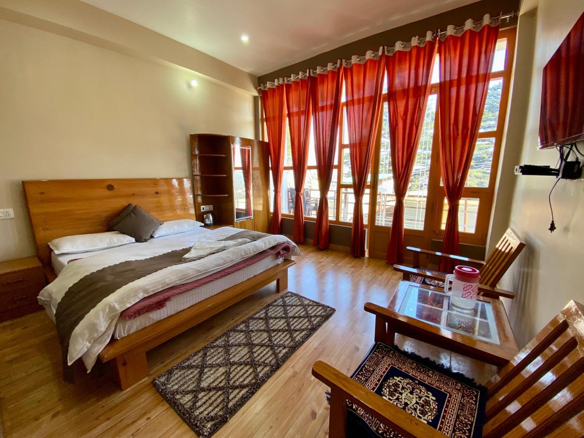 Hotel Mansarovar Inn Munsyari Экстерьер фото